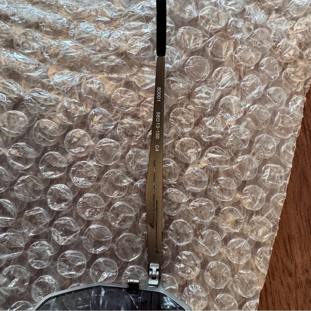 NWT! Titanium Sunglasses in Silver with Black Case - Picture 8 of 12